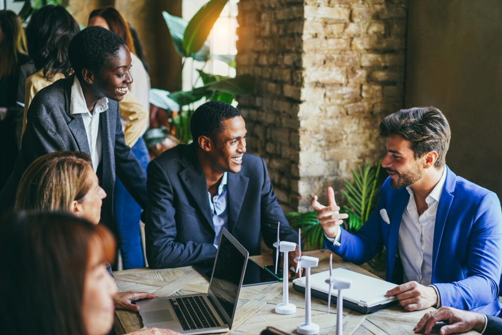 Professionals developing direct marketing campaigns through collaborative planning.